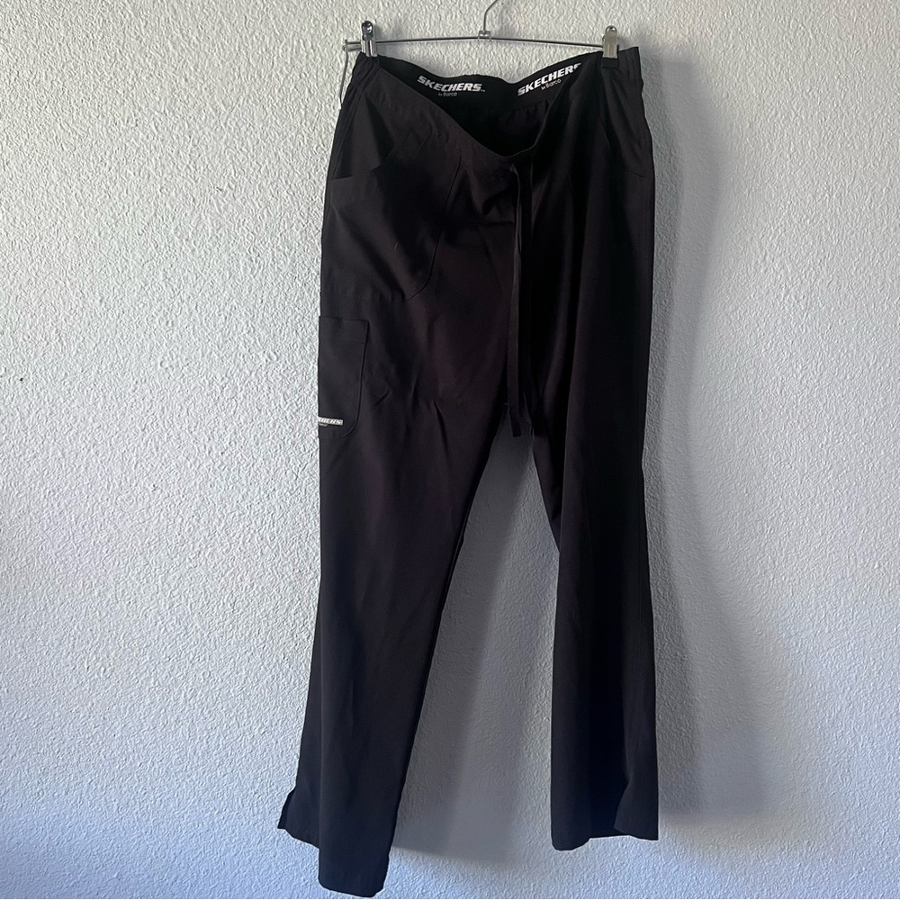 Black Sketchers scrub pants